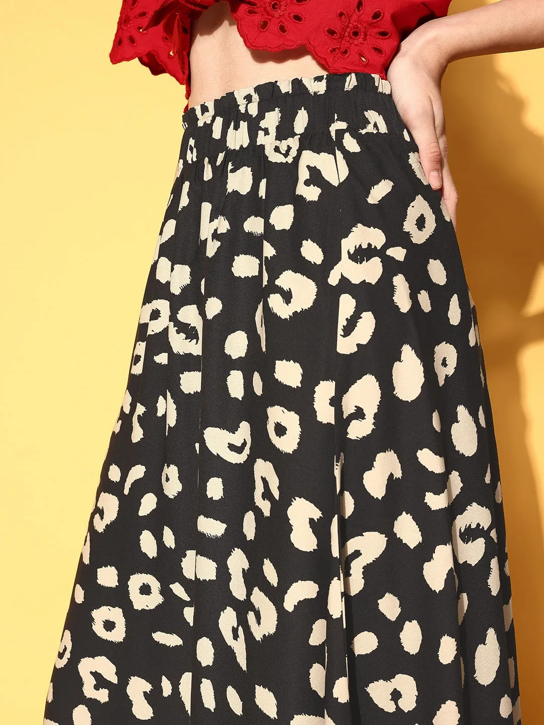 Berrylush Women Black & Cream Animal Printed Crepe Flared A-Line Midi Skirt